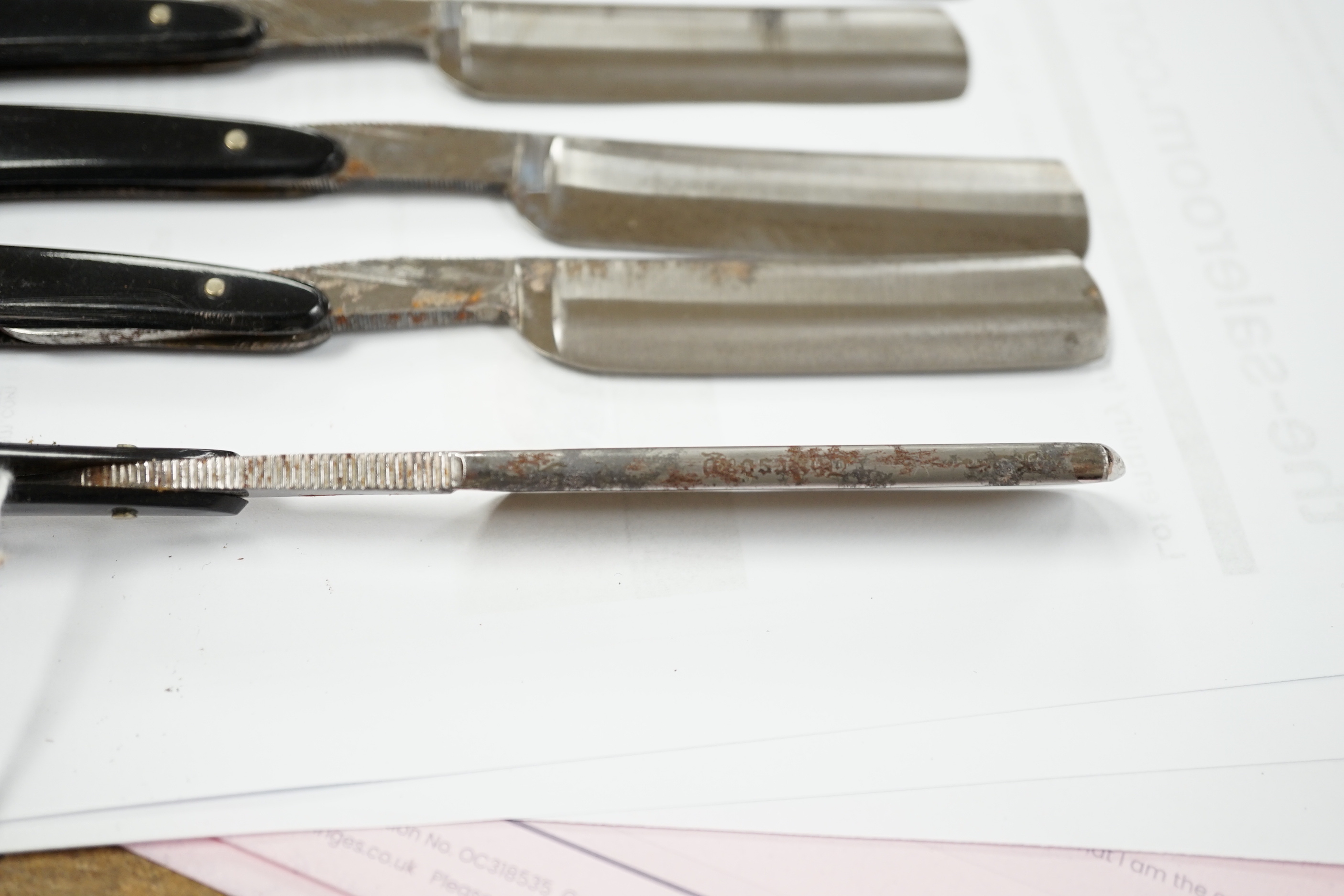 A Wilkinson cased set of seven gentleman's cut throat razors